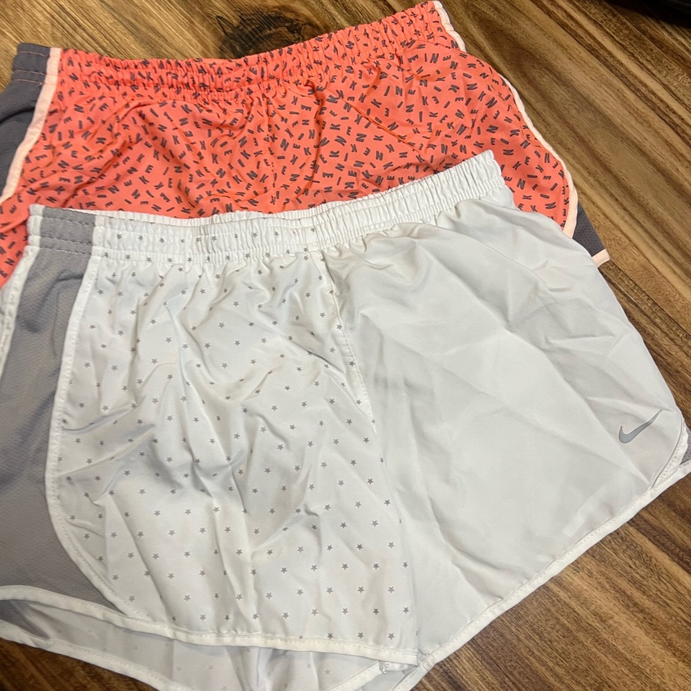 Nike girls dry fit running shorts. Size L. Gently worn. 2 pairs.